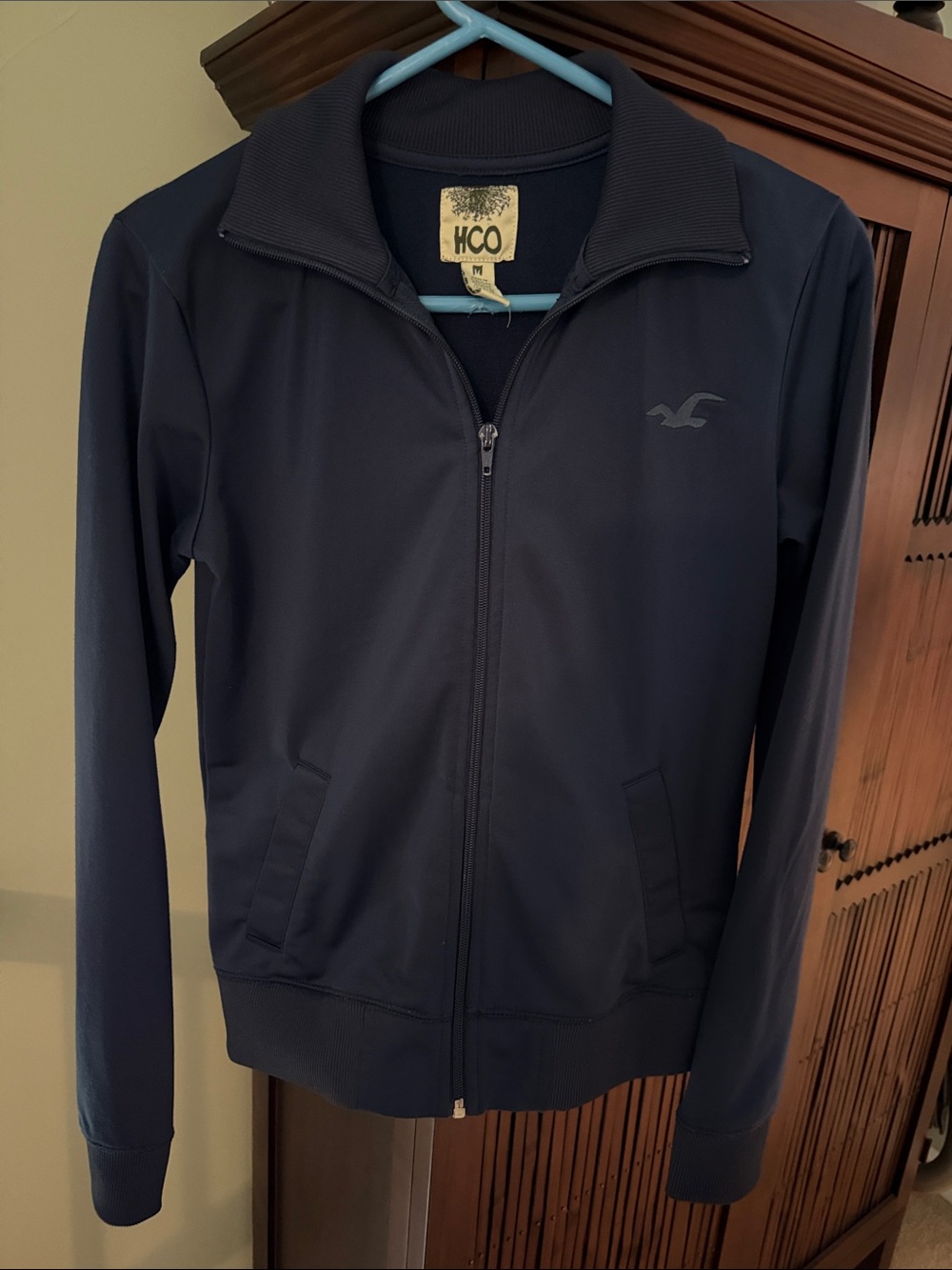 HCO navy blue Zippered jacket.